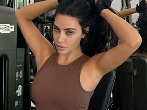 Kim Kardashian uses muscle stimulator pads for 'leg day' at the gym