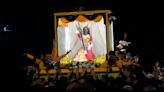 Filipino Catholics pray for Mideast peace in massive procession venerating a black statue of Jesus