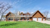 Granville log mansion hits market for $1.7 million, with indoor pool and basketball court