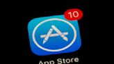 Apple will open iPhone to alternative app stores, lower fees in Europe to comply with regulations