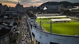 Thousands of fans queue for hours to pay their last respects to king of football