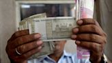 Rupee inches up as risk assets rally, gains capped by weak equities