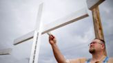 Anti-death penalty crosses on church lawn get refresh ahead of next set Oklahoma execution