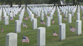 Local Scouts decorate graves for Memorial Day