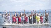 Best pictures as 500 dookers take to the sea off Leven beach