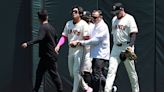 Giants center fielder Lee (dislocated left shoulder) placed on IL