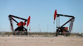 Oil settles down ahead of OPEC+ meeting, posts weekly loss