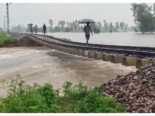 Akhilesh Yadav Mocks BJP As Railway Tracks Hang After Rail Bridge Gets Washed Away - Viral Video