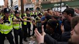 Police officers injured as far-right activists face off against anti-racism groups across UK | World News - The Indian Express