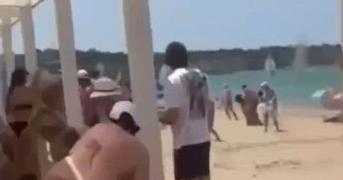 Horror moment Russian sunbathers struck by deadly shrapnel raining down on beach