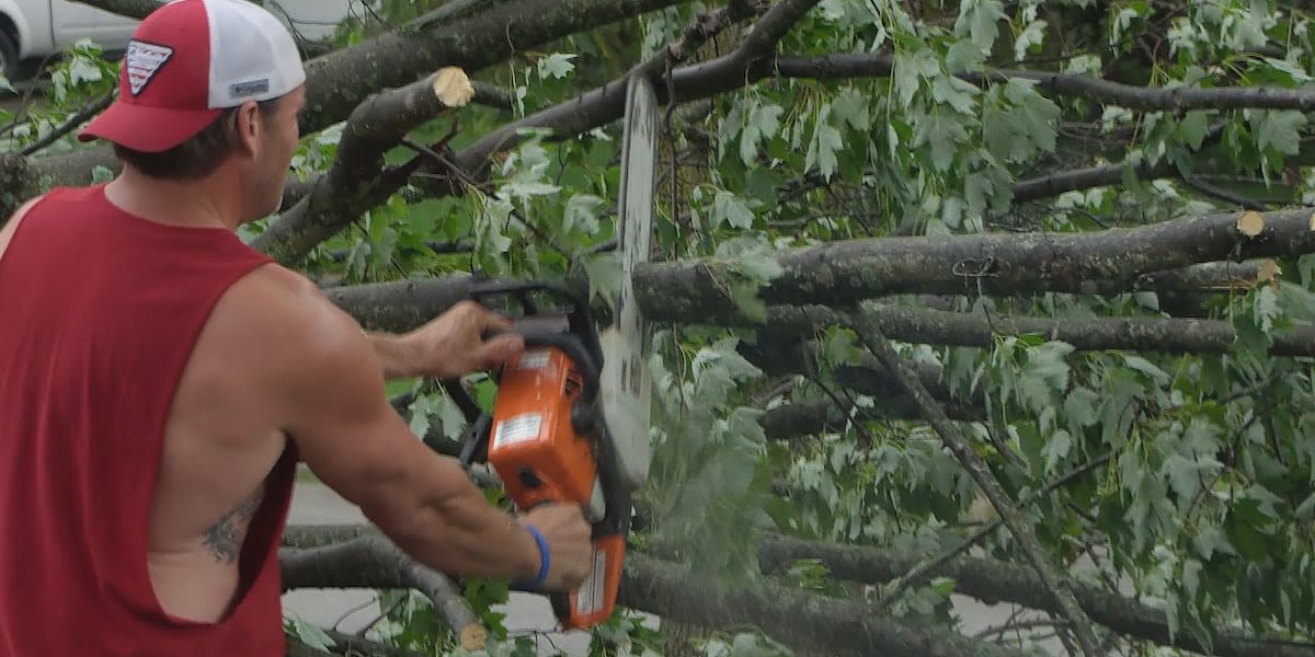 Neighbors clean debris after Sunday’s first wave of storms