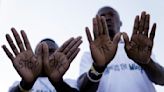 After quiet days, handful of protests at UN climate summit