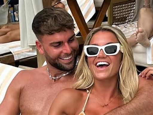 Bikini-clad Molly Smith and boyfriend Tom Clare show off their toned physiques as they put on a loved-up display in Dubai