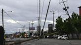 North Seattle crash knocks out power for hundreds, shuts down road