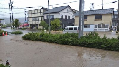 Japan orders mass evacuation as heavy rain lashes region recovering from earthquake