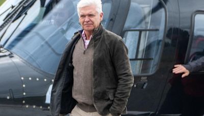 Phillip Schofield arrives at Silverstone in helicopter with entire family