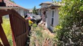 Paso Robles resident rescued from car after crashing into house, police say