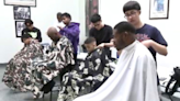 Students clipping their future career with goodwill haircuts in the community