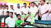 EPS distributes relief to people displaced by floods | Coimbatore News - Times of India