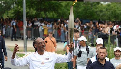 Paris Olympics 2024: Snoop Dogg stars as flame sails into Paris for opening ceremony