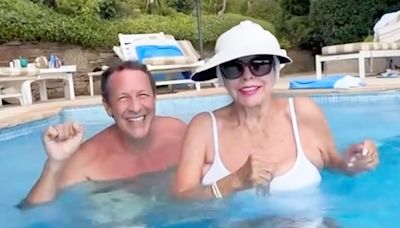 Joan Collins, 91, Dances in the Pool to ‘Happy’ by Pharrell Williams During Vacation — See the Video!