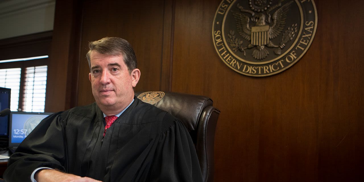 This Judge Made Houston the Top Bankruptcy Court. Then He Helped His Girlfriend Cash In.