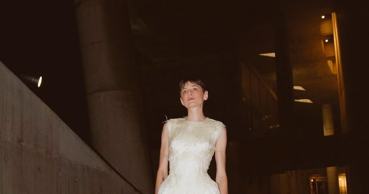 Emma Corrin's Avant-garde Dress Has a Flock Ton Of Feathers