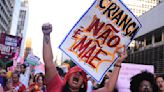 Outraged Brazilian women stage protests against bill to equate late abortions with homicide