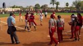 ‘The right thing to do’: College softball players carry injured opponent around bases after grand slam