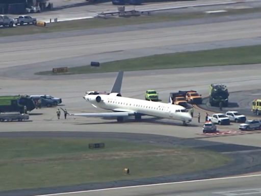 Plane Collision Nearly Severs Tail of Aircraft From Body at Atlanta Airport: Video