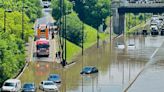 Torrential rains flood Toronto, causing power outages, traffic disruption