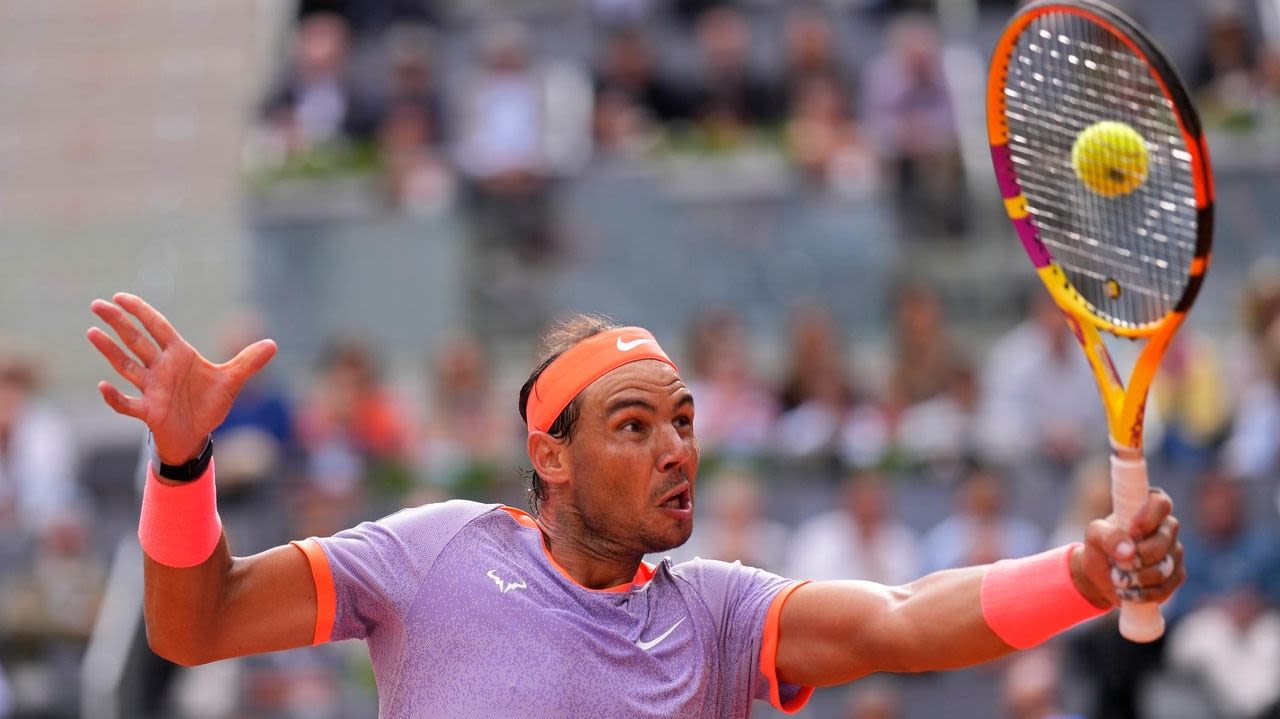 Nadal tested in a 3-hour win over Cachin at Madrid. Swiatek reaches the women's quarterfinals