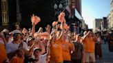 Knoxville welcomes Tennessee baseball back as champions. Players glad to do it for fans