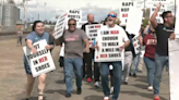 Men walk a mile in heels for Sexual Assault Awareness Month