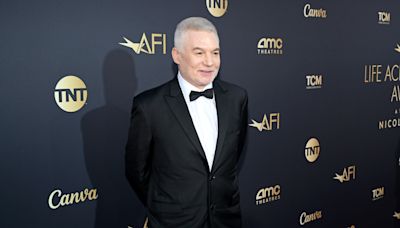 Mike Myers steps out as a silver fox for rare red carpet appearance