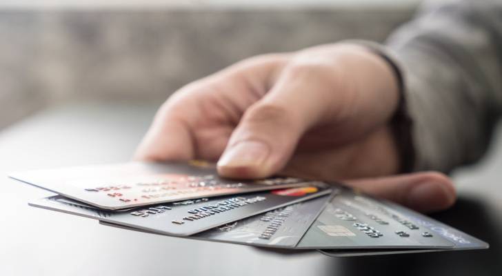How many credit cards is too many? See how you stack up against the American average — plus 3 straightforward signs you’re packing too much plastic