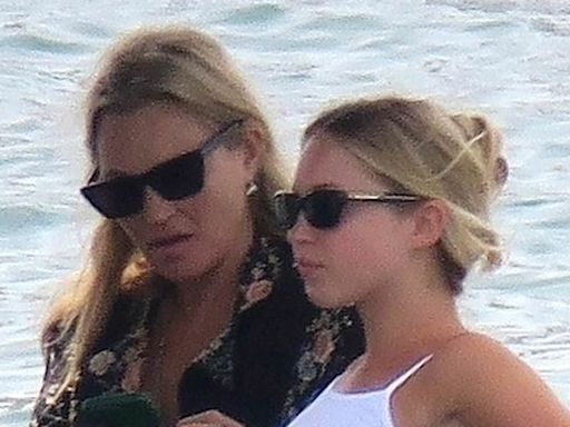 Kate Moss takes a water taxi to Ibiza with lookalike daughter Lila