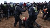 Protesters march on German village, clash with police in opposition to coal mine expansion