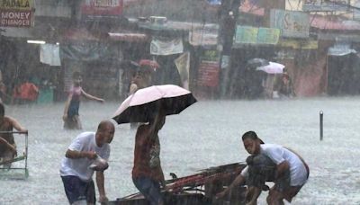 Taiwan prepares for strong typhoon as monsoon rains kill 13 in the Philippines