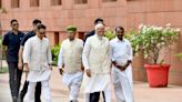 Newly confident opposition stages walkout as Modi address India’s new parliament