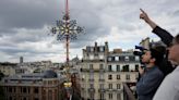 Notre Dame cathedral cross reinstalled in Paris amid restoration efforts