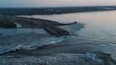 Video shows floods pouring into southern Ukraine's war zone after a major dam was destroyed, sparking a new flashpoint in the war