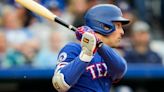 Lowe has 4 hits as Rangers beat Royals 15-4