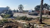 Israeli forces seize Gaza side of Rafah border crossing, putting cease-fire talks on knife's edge