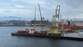 Cranes on site as investigations continue at dry dock where vessel toppled over