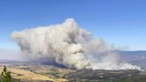 Rapidly spreading fire in Northern California prompts evacuations as heat wave grips the state