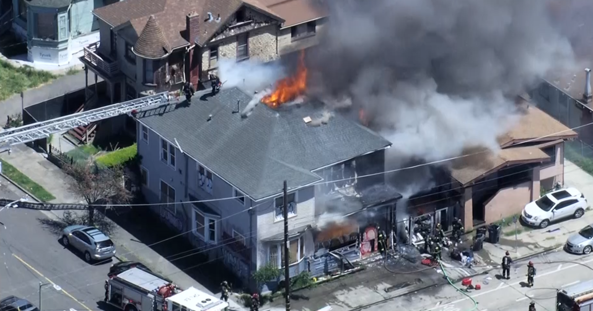 Oakland fire crews knock down house fire near Laney College
