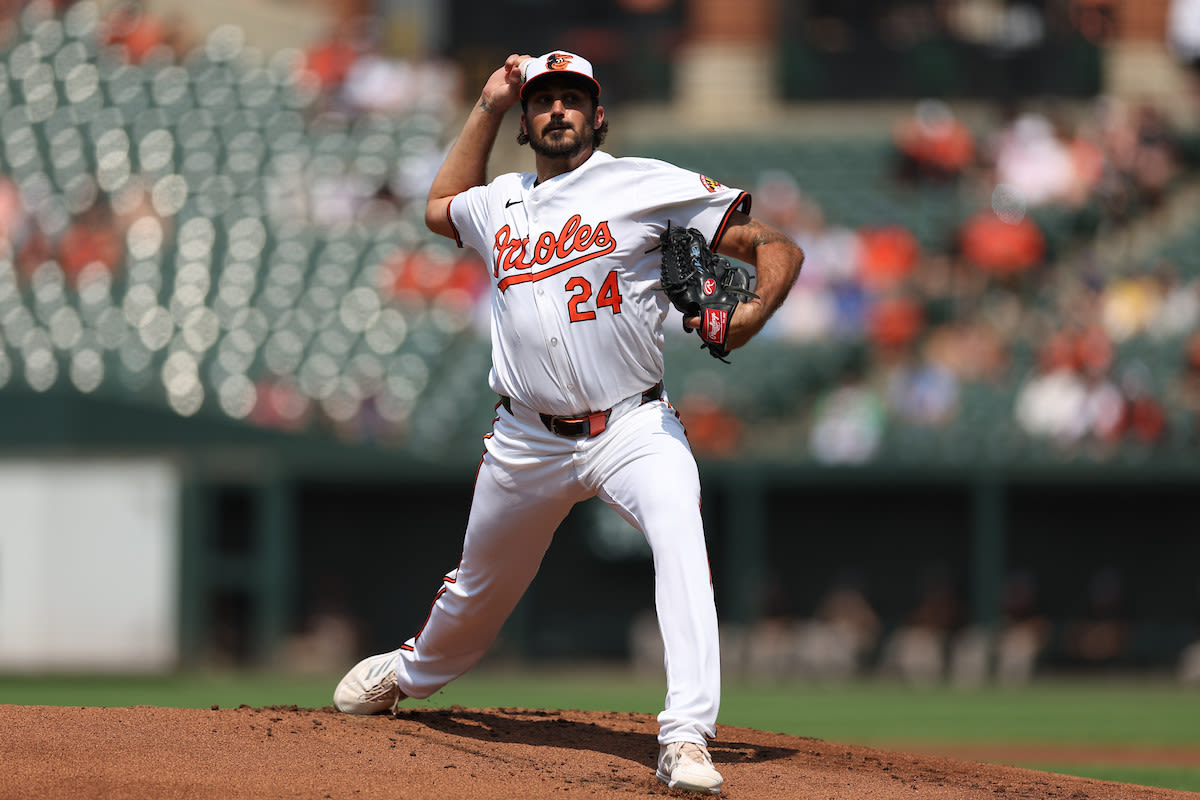 Eflin earns first Orioles win in Game 1, McCann catches fastball in face and keeps playing