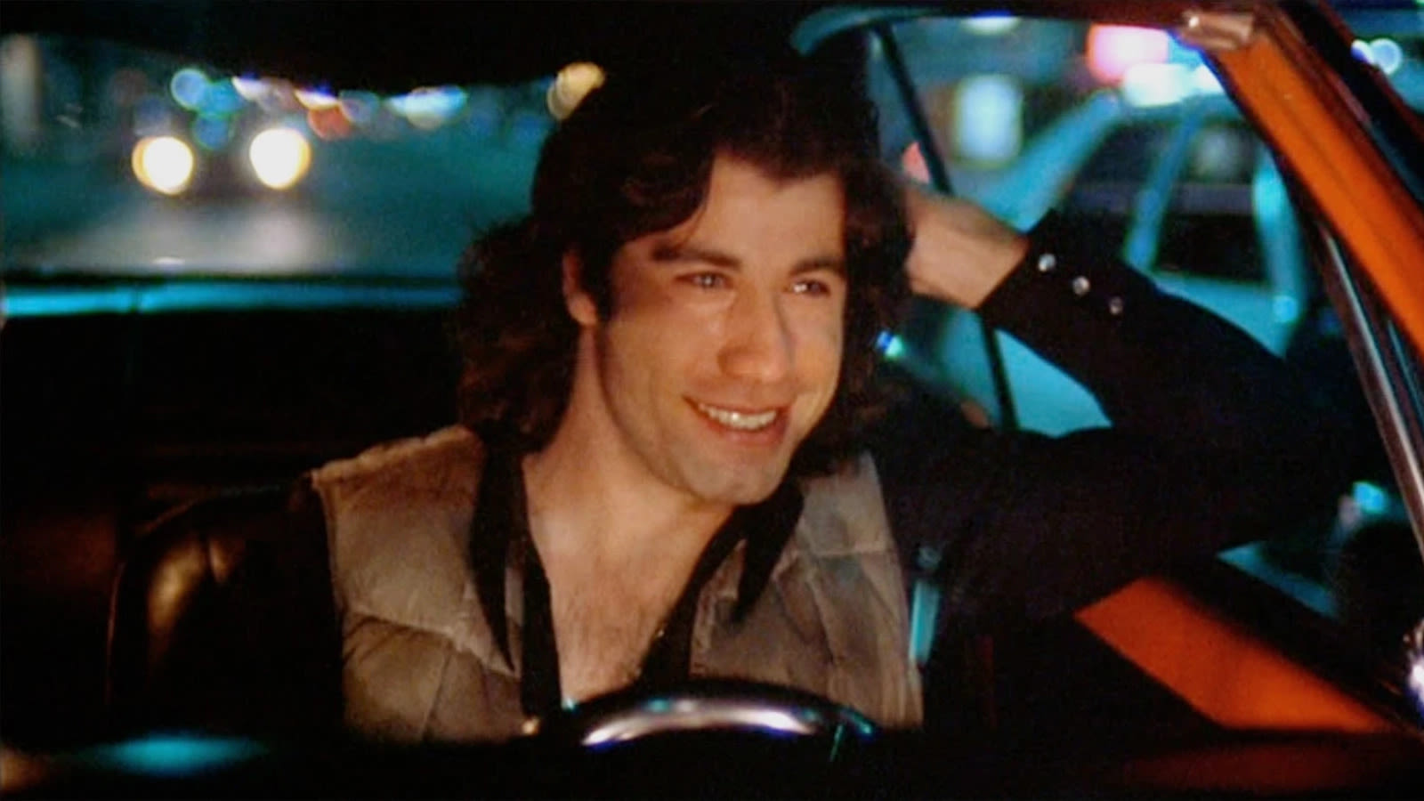 John Travolta Showed Up To His Carrie Audition In A Hilariously Unthreatening Costume - SlashFilm