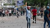 Bangladesh shuts down schools indefinitely in wake of violent protests that killed 6 students